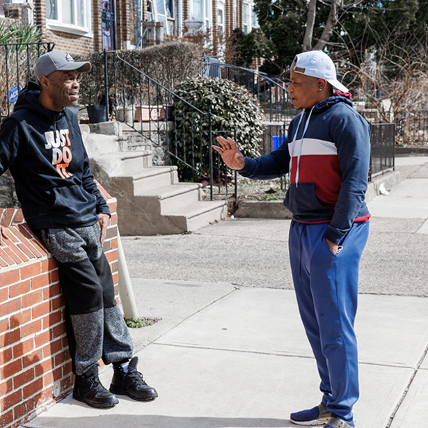 two men talking